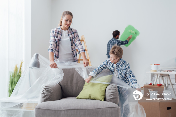 Family painting their home