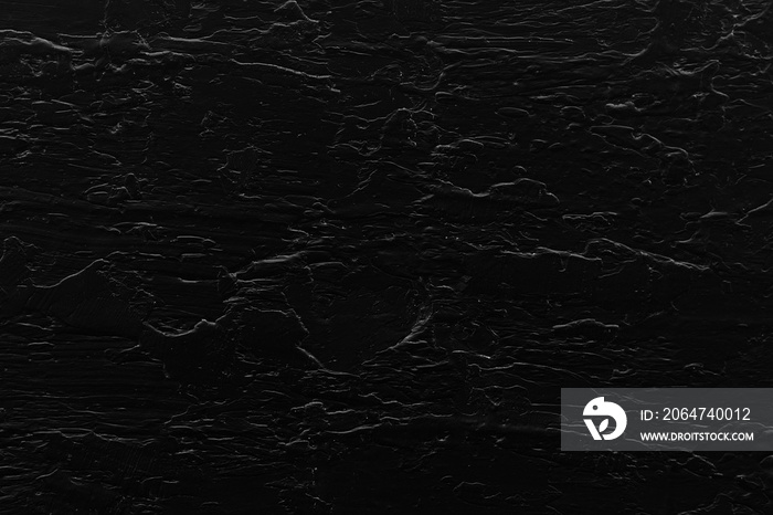 Black cracked textured wall background