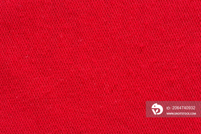 Red fabric canvas macro shot as texture or background