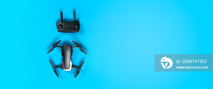 drone dji mavic air and control panel, on a blue background, panoramic mock-up