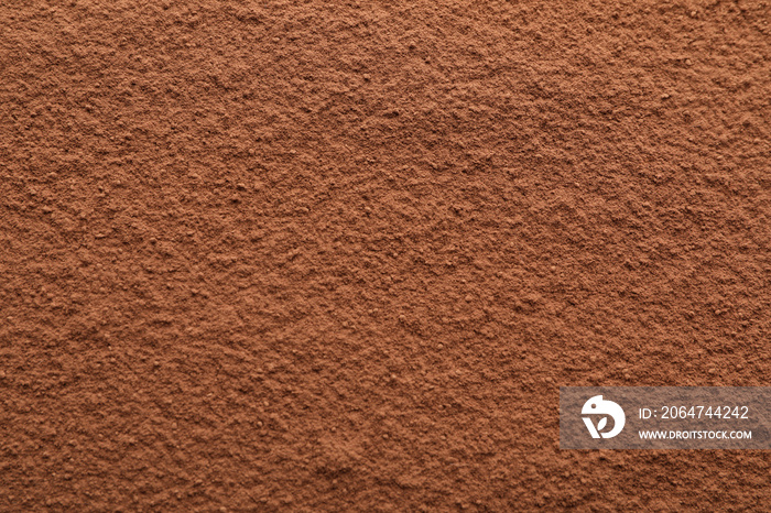 Cocoa powder textured background, close up and space for text