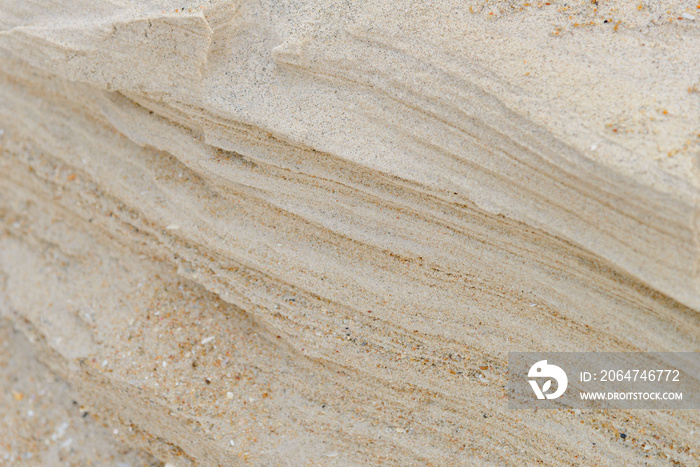 海滩上的砂层，岸边的软砂岩。抽象背景纹理