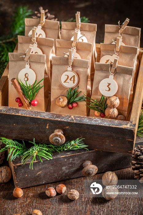 Handmade Christmas Advent Calendar stacked in a wooden drawer