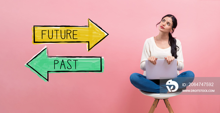 Future or past with young woman using a laptop computer