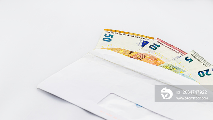 Euro bills in white envelope on white background, gift concept, bribery, copy space, selective  focu