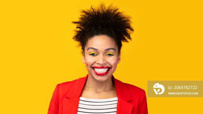 Close up headshot portrait of laughing black girl