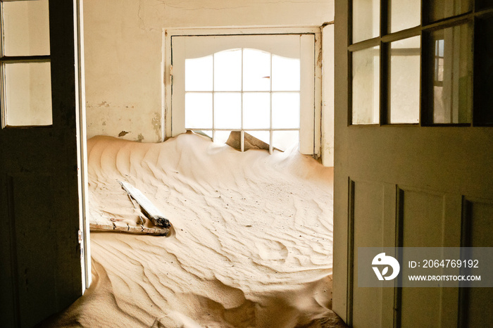 Interior of old building in abandoned diamond mining town of Kolmanskop (Kolmannskuppe), Namibia