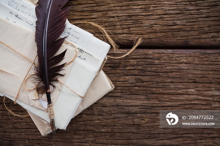 Quill feather with nostalgic letters