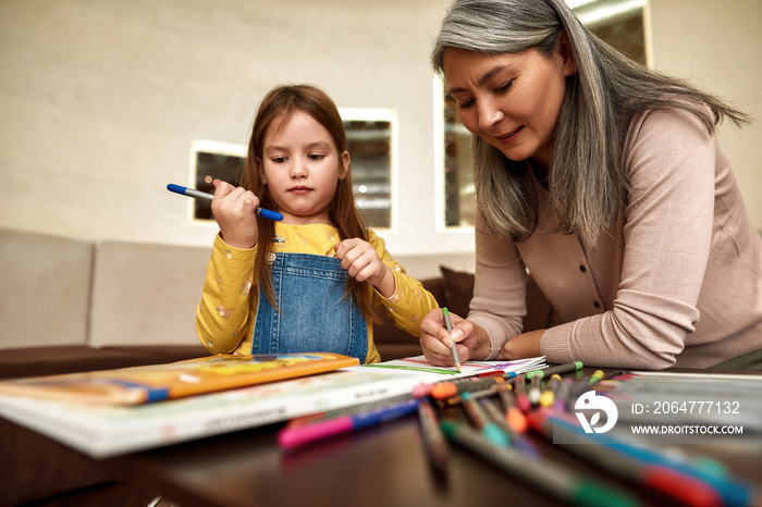 Art therapy lesson for little girl at home