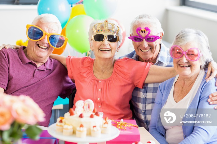 Seniors wearing funny glasses