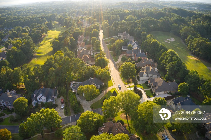 Beautiful aerial view of a sub division with golf course and a beautiful lake  in suburbs of Atlanta