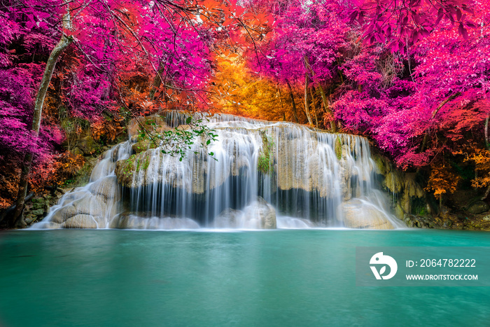 Amazing in nature, beautiful waterfall at colorful autumn forest in fall season