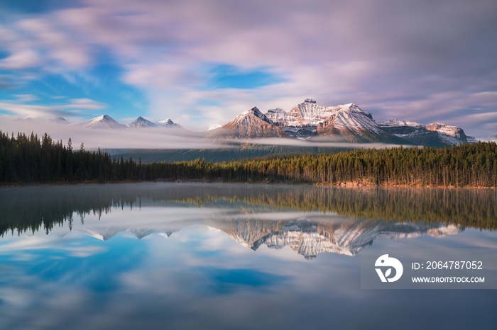 Lake Herbert panorama in a foggy morning with glaciers mountain and reflection in Banff National Par