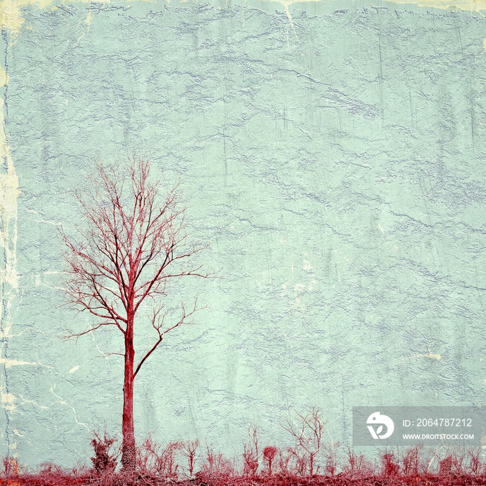 Surreal landscape with red single tree