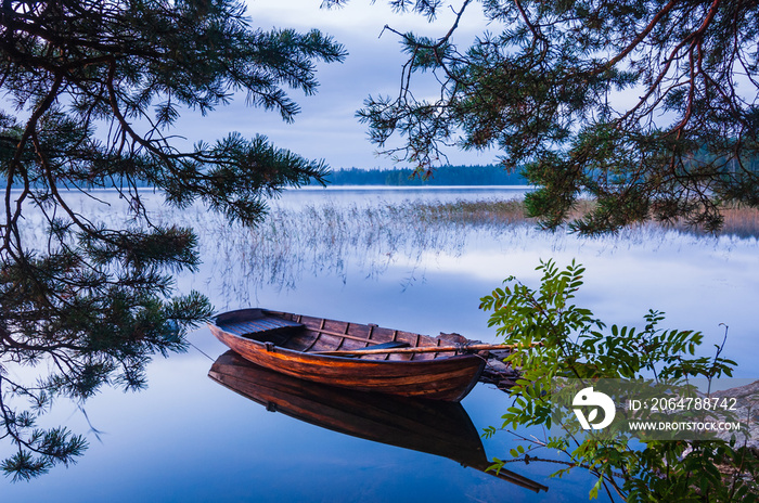 Wooden boat on lake Finnsjön, Sweden