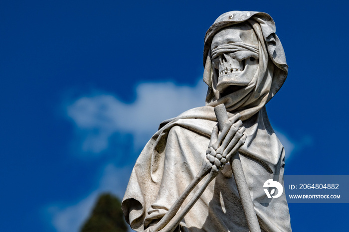 death marble statue over a tomb in florence cemetery