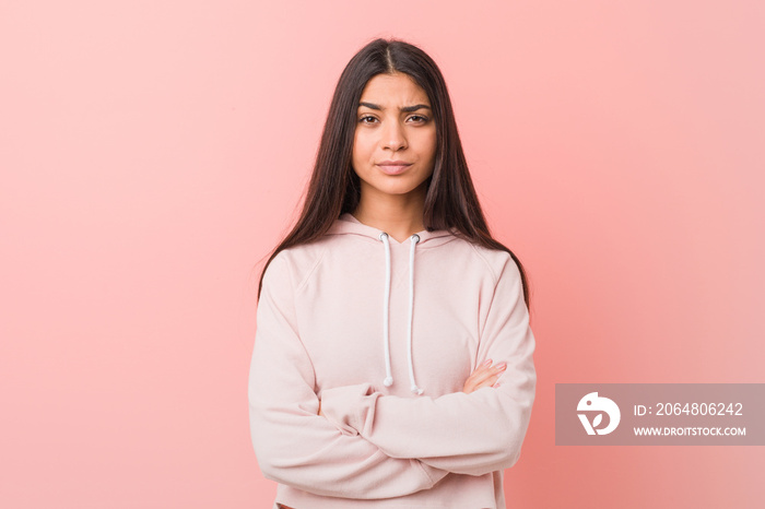 Young pretty arab woman wearing a casual sport look unhappy looking in camera with sarcastic express