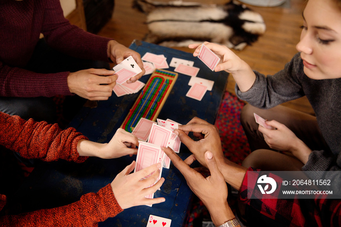 Friends playing cards