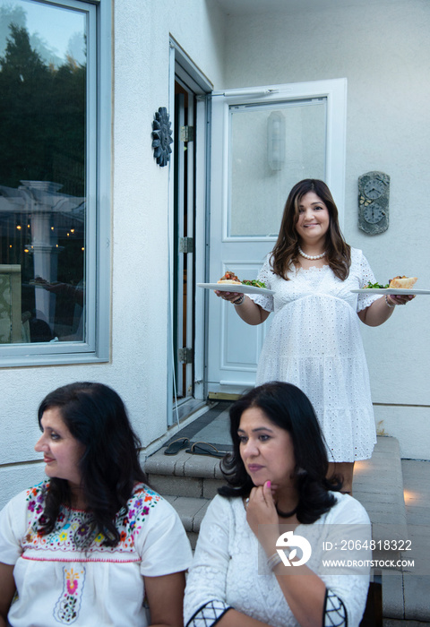 Woman serving dinner