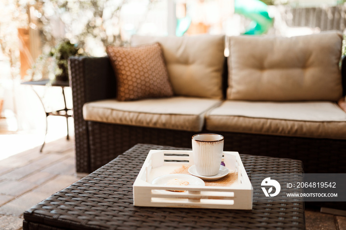 Coffee and cookie tray on the patio early in the morning