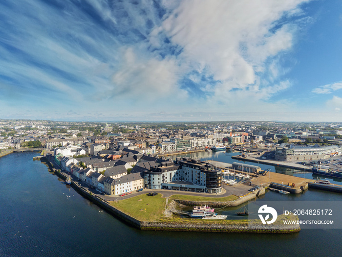 Aerial view on Galway city, river Corrib, Claddagh area, Sunny day, Cloudy sky.