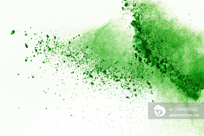 抽象粉末飞溅的背景，绿色粉末爆炸/投掷绿色灰尘的冻结运动