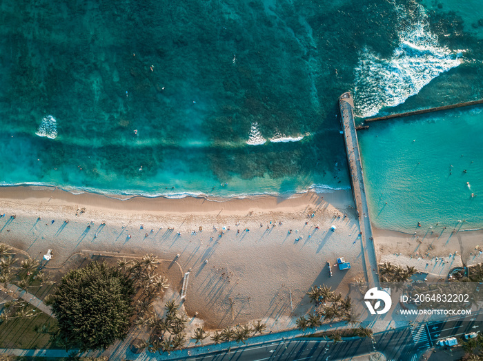Aerial drone shot view of Waikiki beach in Honolulu in Hawaii in summer time