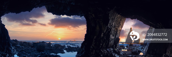 Sunrise from inside the cave of Campiecho in Asturias, Spain.