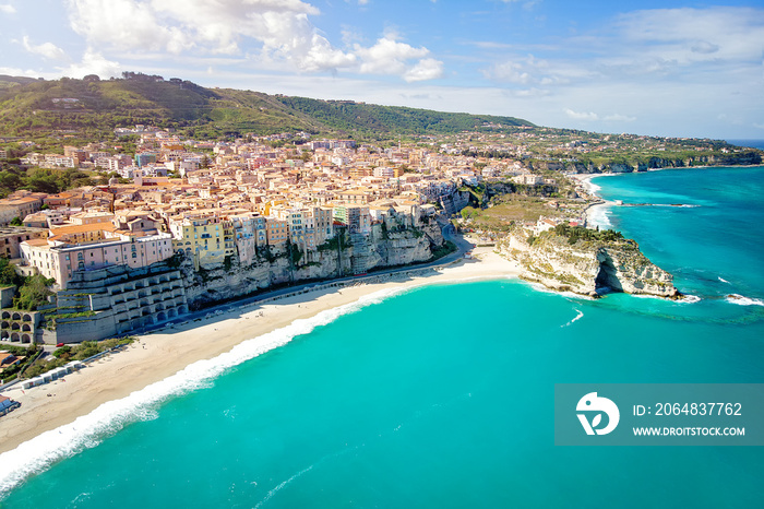 City of Tropea, tourist destination in Calabria, Italy. Aerial view of city, monastery and coastline