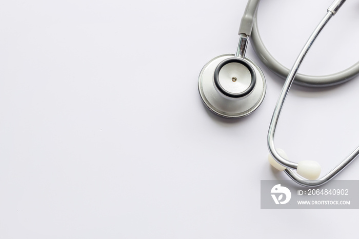 closeup stethoscope on white background. soft-focus and over light