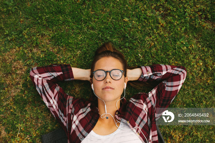 Female student relaxing at campus