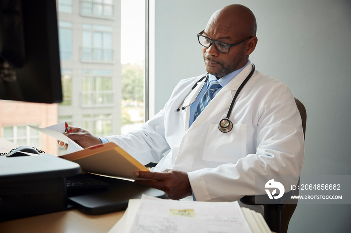 Doctor working on computer