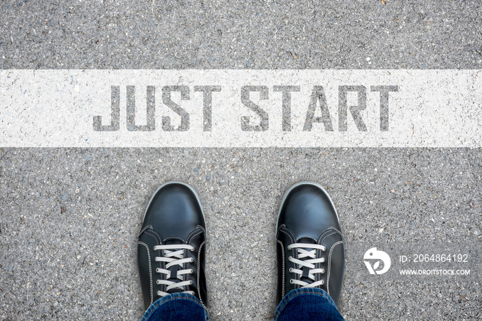 Black casual shoes standing at just start line