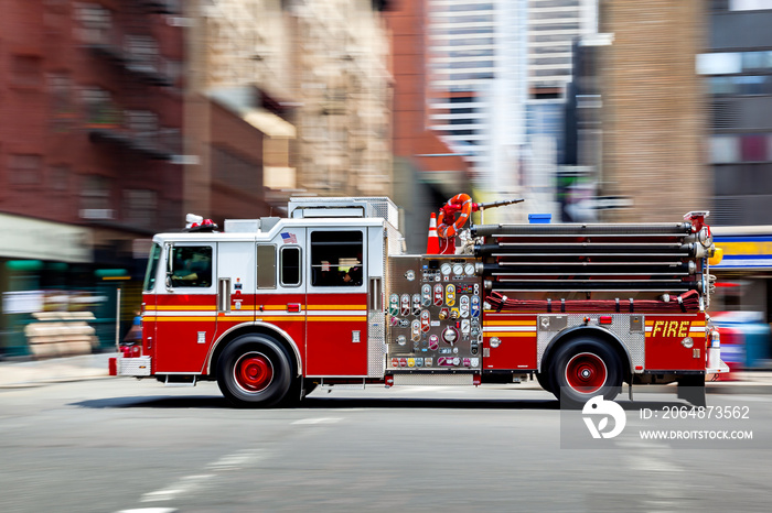 fire trucks and firefighters brigade in the city