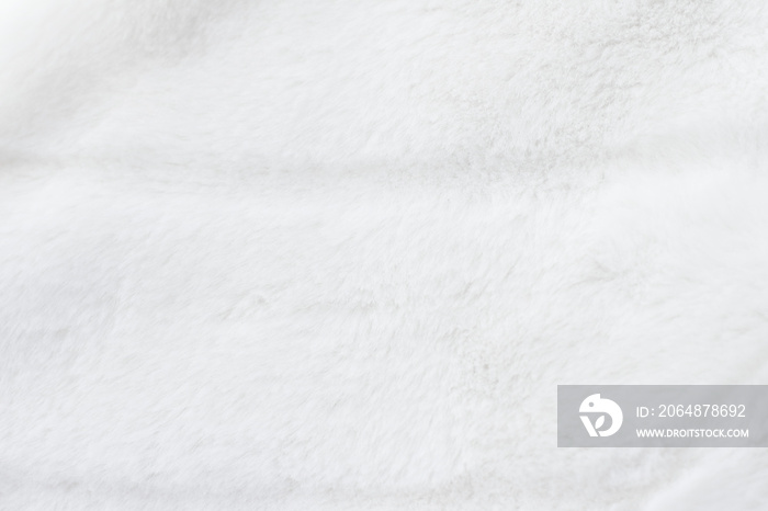 奢华的白色毛皮大衣纹理背景，人造织物细节
