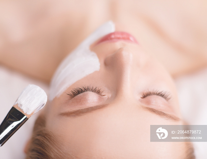 Spa facial mask application. Spa beauty organic facial mask application at day spa salon