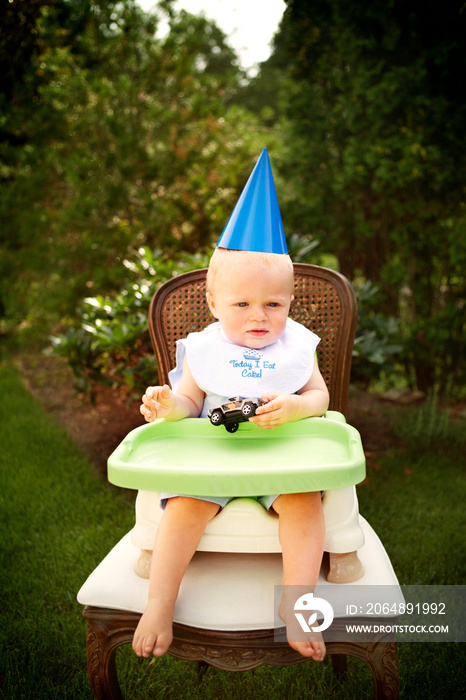 Boy (12-17 months) during his birthday party