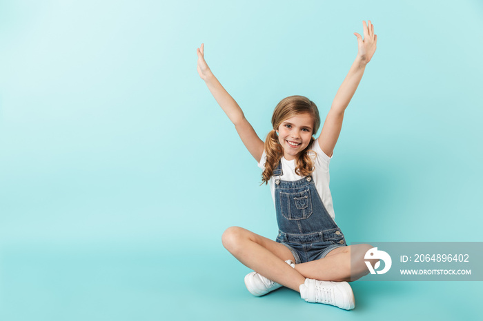 Portrait of a cheerful little girl isolated