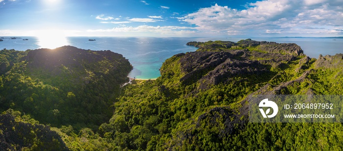 drone aerial panorama of pristine uninhabited island with bizarre tsingy rock formation/ madagascar/