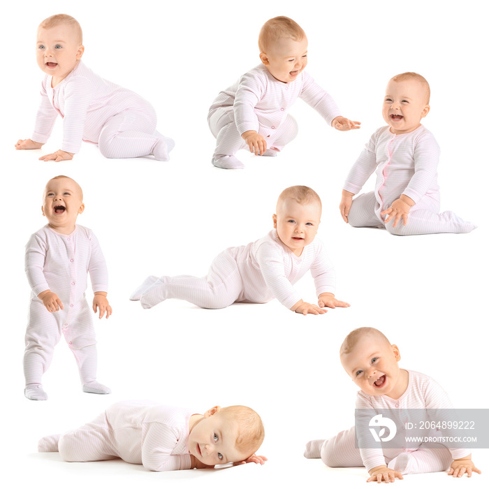 Cute little baby learning to walk on white background