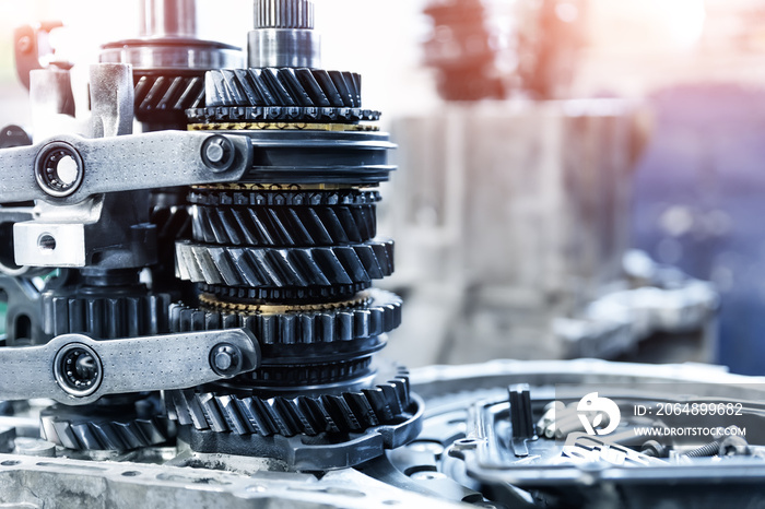 Closeup disassembled car automatic transmission gear part on workbench at garage or repair factory s