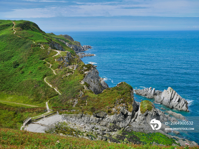 The north Devon coast near Lee Bay showing the steeply inclined slate strata of the Morte Slates For