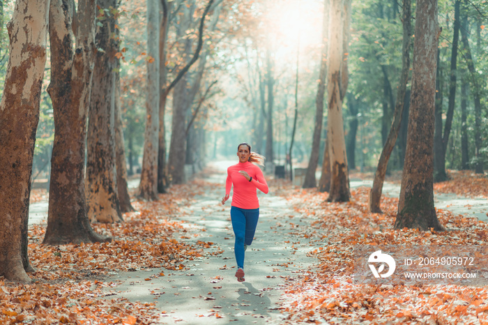 Woman Jogging Outdoors in Park