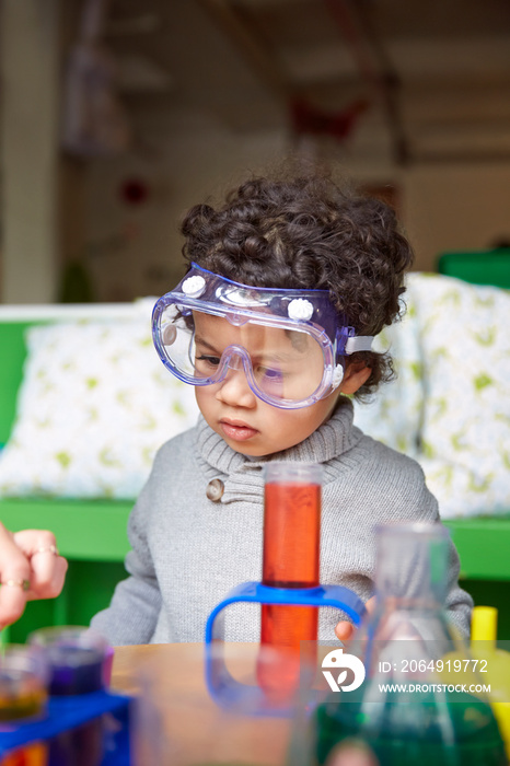 Boy (2-3) playing with toys