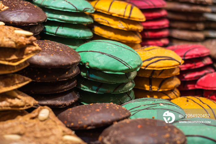 Stacks of Nuremberg gingerbread in different colors at the Christmas market