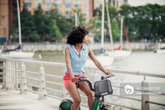 Mid-adult woman cycling