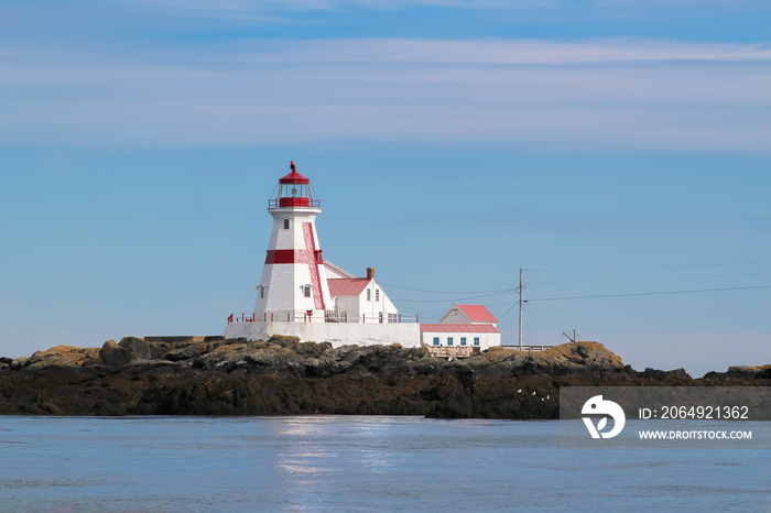 Head harbour Lightstation with Minke whale in the foreground