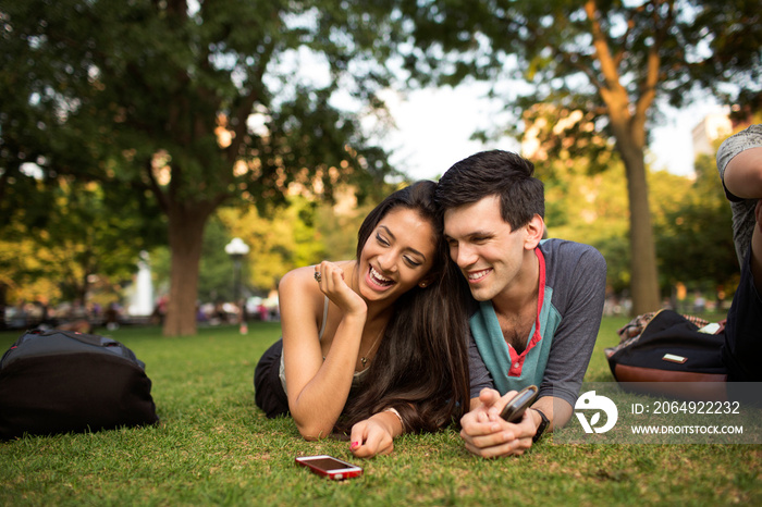 Couple relaxing in park