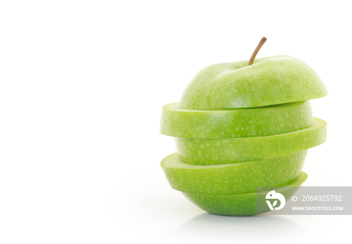 green apple  sliced on a white background