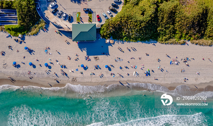 panoramic aerial drone view of Boca Raton Beach, Florida with people on beach